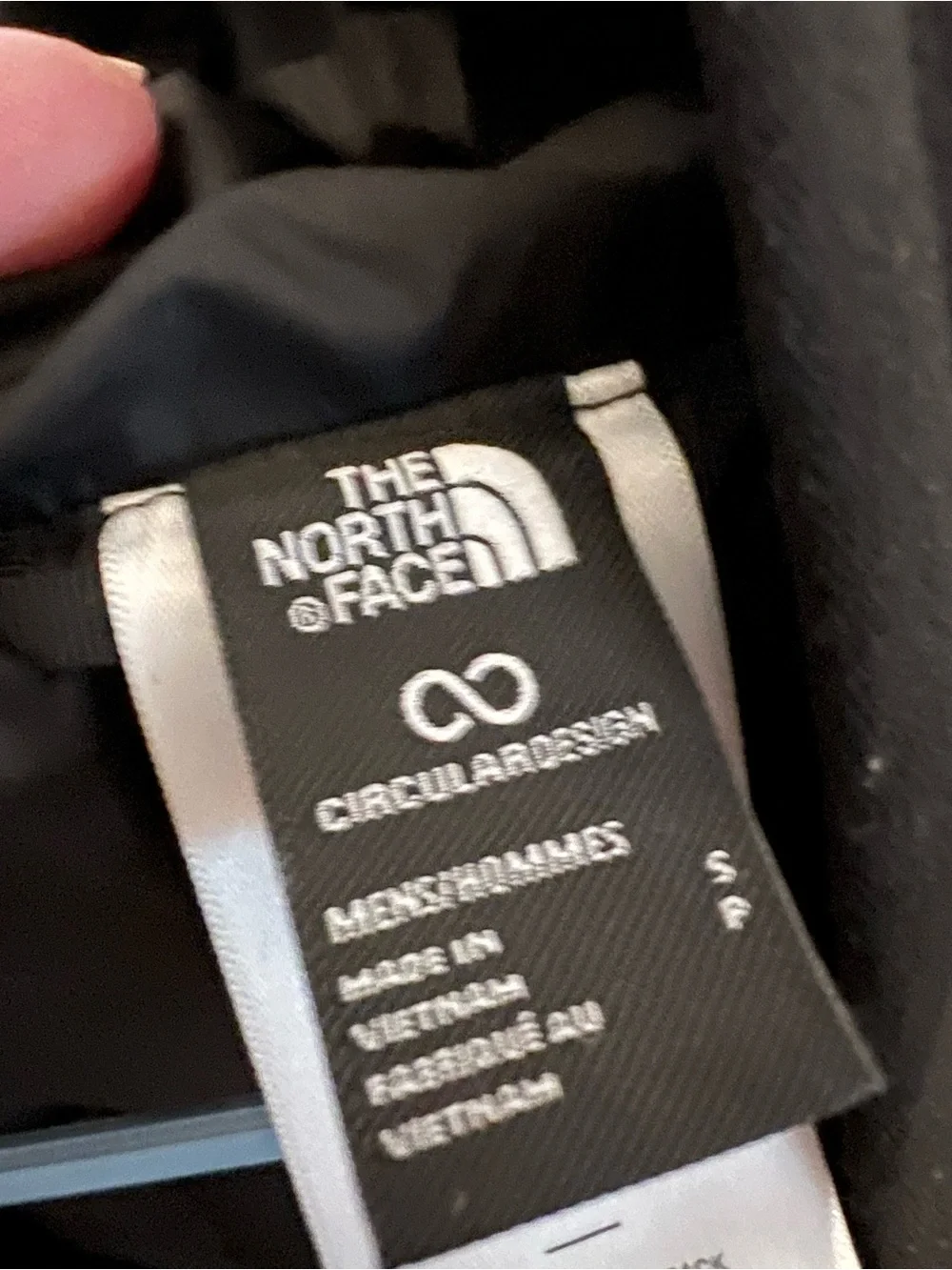 The North Face Black Jacket with white embroidered Tag Detail